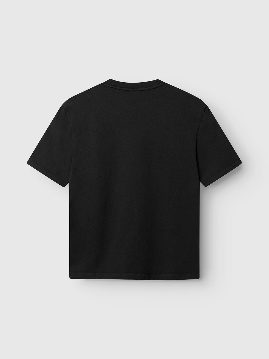 The GABlegin Wix Boxy Hour SS T-shirt by Gabba is shown from the back against a light gray background. Crafted from mid-weight cotton jersey, this black tee offers a relaxed boxy fit and is subtly detailed with an embroidered Gabba logo.