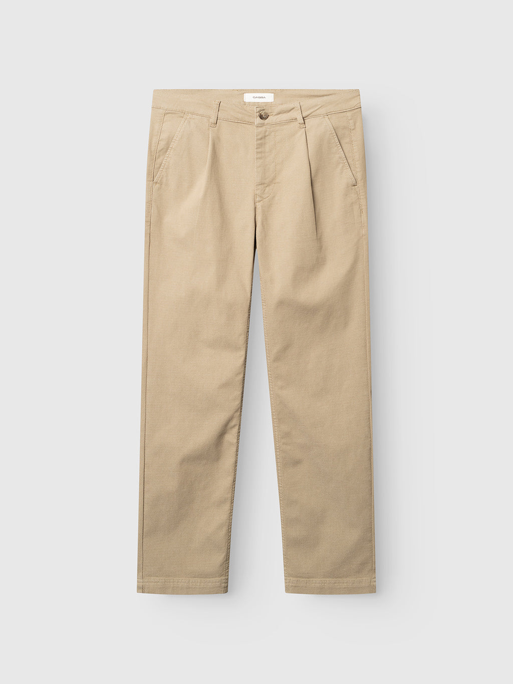 The GABjoe-pas Dale Pant in Sand by Gabba is crafted from a beige high-stretch cotton blend and features tailored front pleats, side pockets, and a button closure, displayed flat on a white background.
