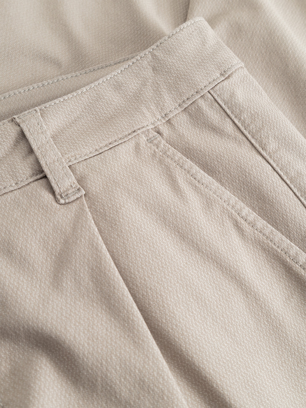 Close-up of the Gabba GABjoe-pas Dale Pant in Grey Paloma, highlighting the waistband, belt loop, and front pocket with visible stitching detail and textured fabric crafted from high-stretch cotton-blend material.
