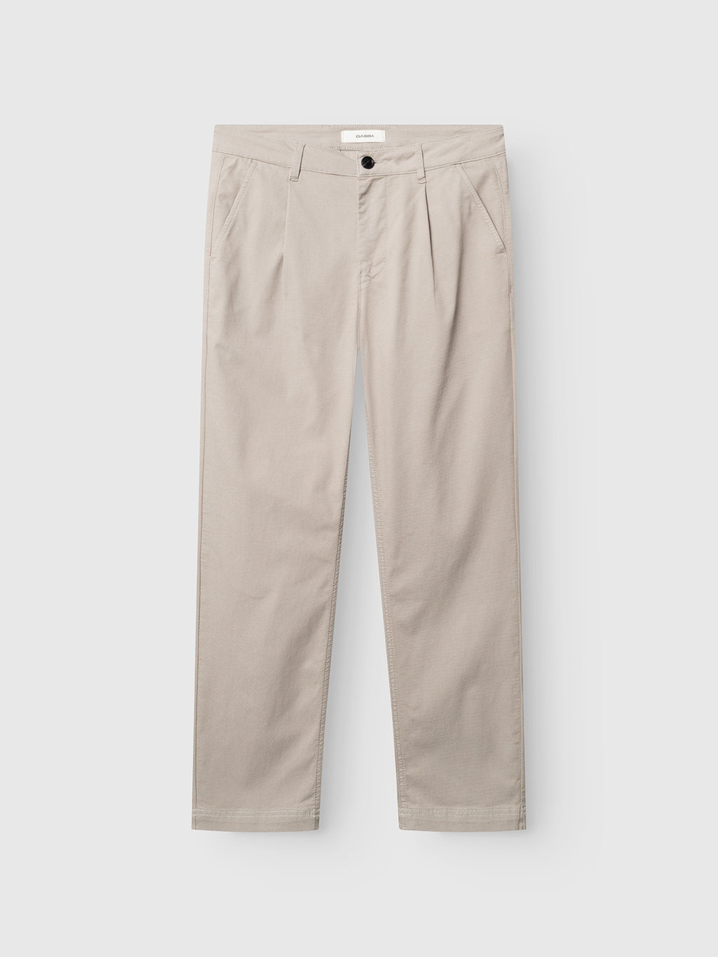The Gabba GABjoe-pas Dale Pant in Grey Paloma features a tailored silhouette crafted from a high-stretch cotton-blend, front pleats, side pockets, a waistband with belt loops, and a single button closure. Shown here laid flat on a white background.