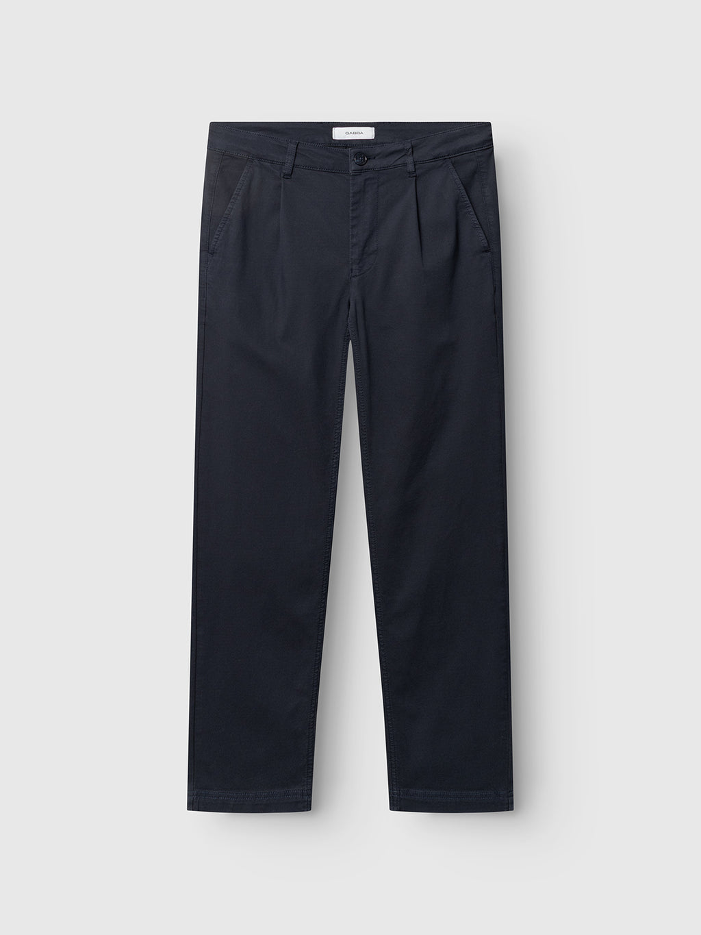 The GABjoe-pas Dale Pant by Gabba in Blue Black features a contemporary straight-leg silhouette with side pockets, pleats at the waist, and a secure button and zipper closure. Crafted from high-stretch cotton-blend fabric for enhanced comfort and flexibility, these trousers are displayed on a plain white background—making them an ideal addition to modern wardrobes.