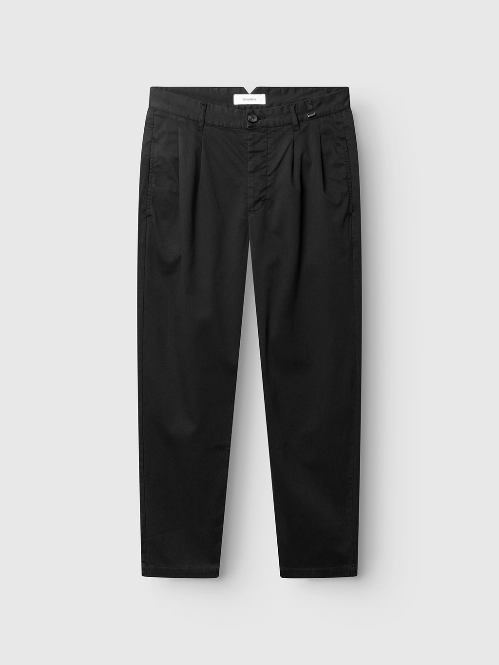 The GABfirenze Cropped Marlo Pant - Black by Gabba, crafted from garment-dyed dobby fabric with a straight-leg silhouette, features front pleats, a button and zip closure, and side pockets, shown laid flat on a white background.