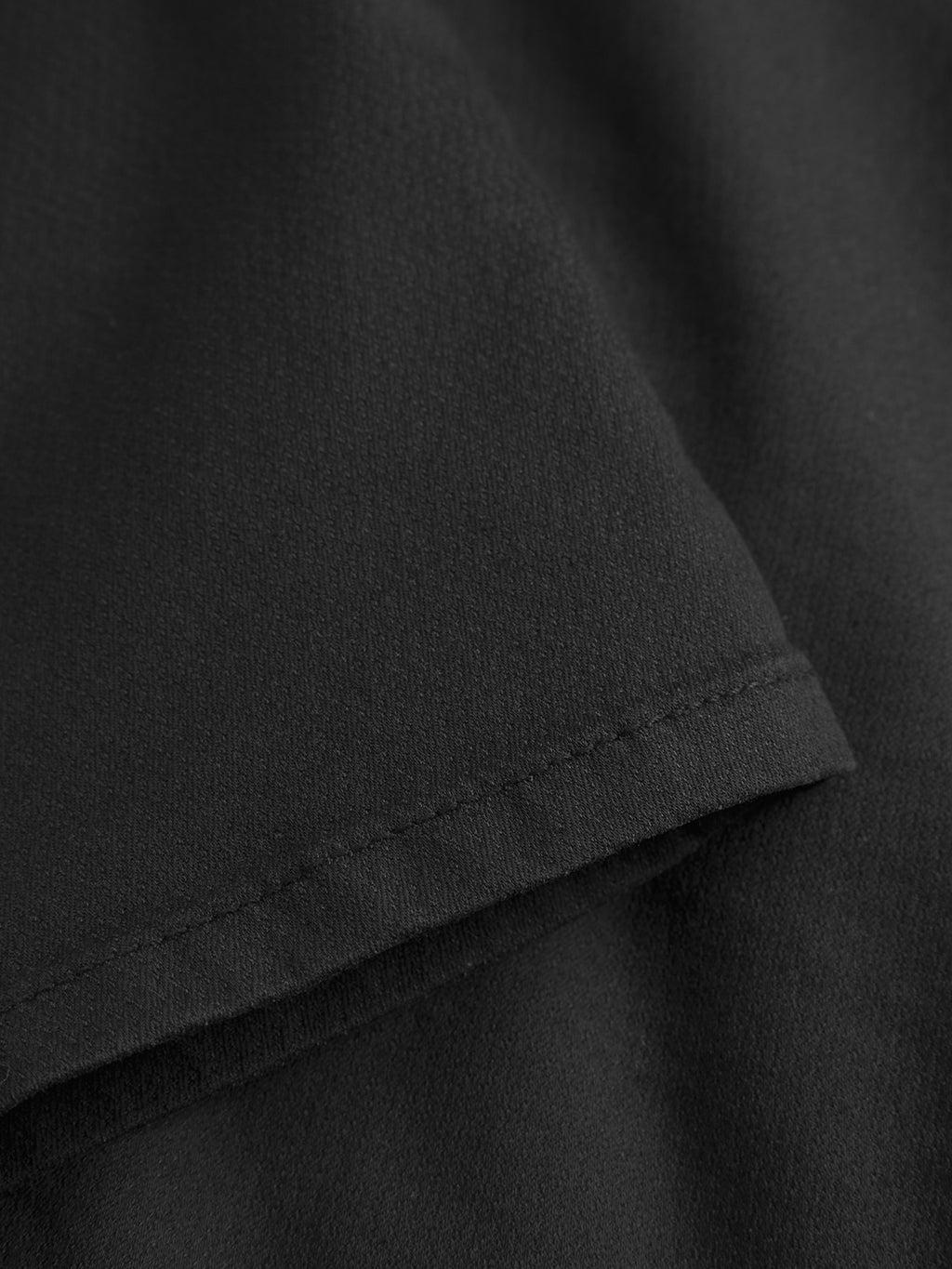 Close-up of the GABBA GABpaul K3280 Dale Chino in black, showing smooth, slightly textured fabric and visible stitching—details that highlight its slim fit and double paspel back pockets.