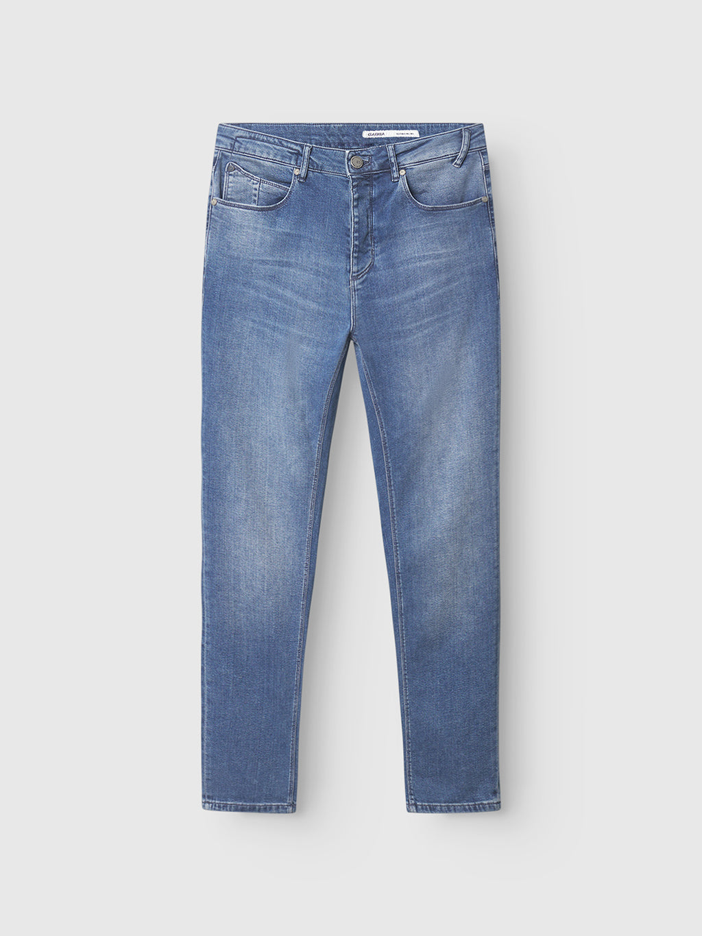 A pair of GABBA GABrey K3866 TENCEL™ Jeans in denim wash, featuring a classic five-pocket design, button and zip closure, and a slightly faded look, laid flat on a white background.