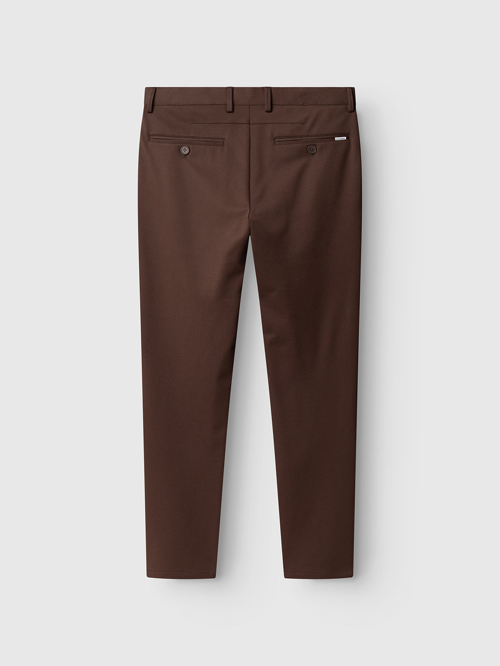 The Gabba GABpaul Dotty Pant in Brown Slate is displayed from the back on a plain white background, highlighting its slim chino fit with a subtle micro-pattern weave, two buttoned welt pockets, and belt loops.