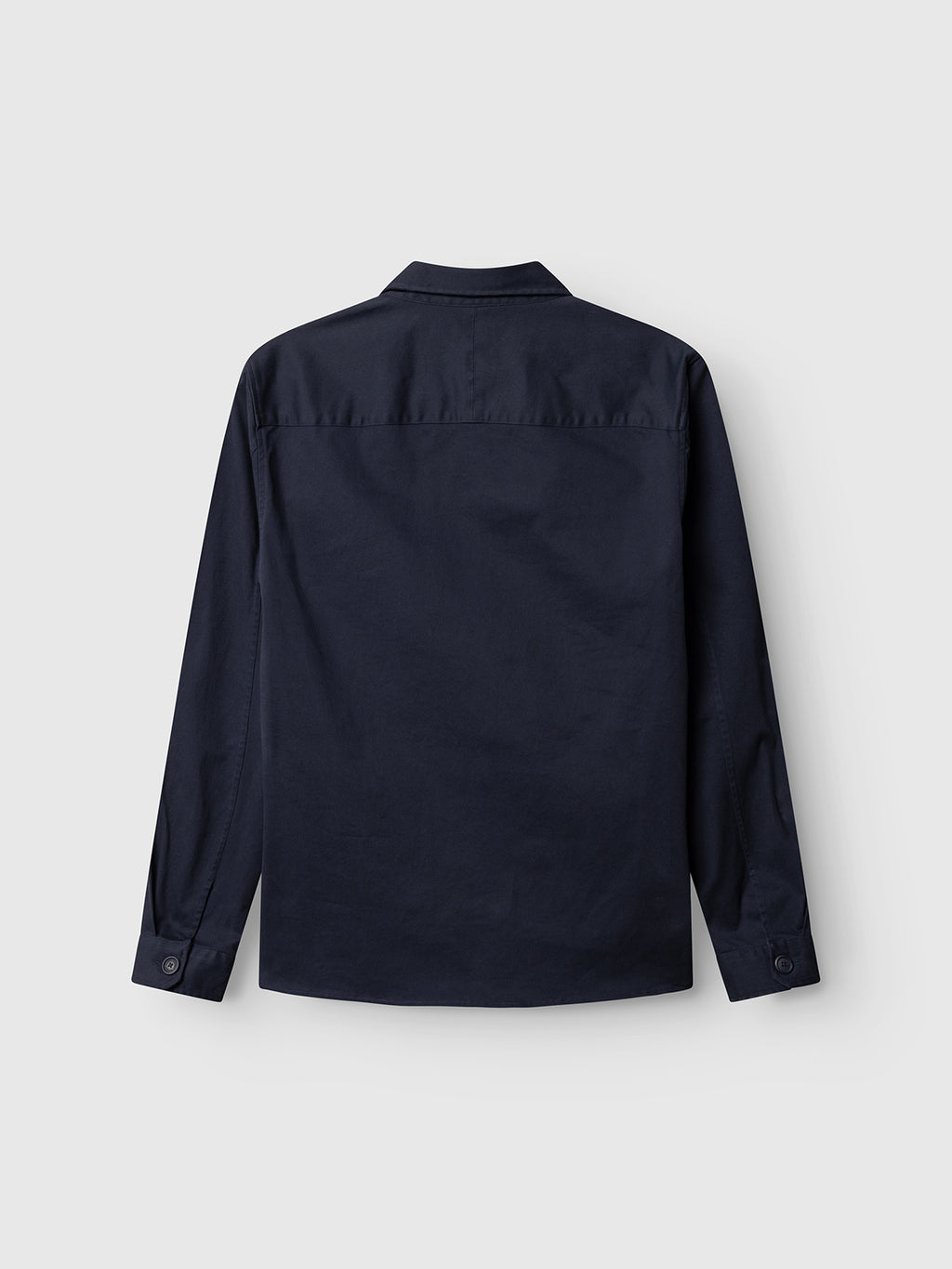 The Gabba GABtopper LS Shirt in Blue Black, a long-sleeve button-up designed as a versatile layering essential, is displayed from the back against a plain light gray background.