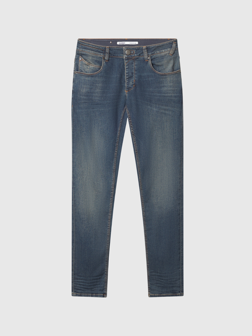The GABBA GABrey K3606 Mid Blue Jeans in mid blue denim feature a slim fit, subtle fading on thighs and knees, five pockets, and a button-zip closure—perfect for a laid-back look. Displayed on a light gray background.